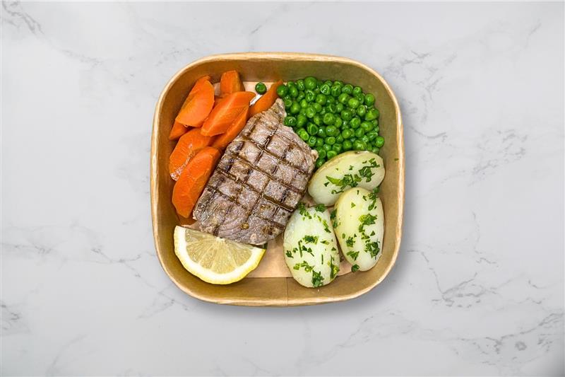 Tuna Steak With New Potatoes Carrots And Peas
